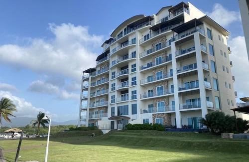 Bouvet Island Condo | Caribbean luxury with direct ocean, palms & white sand views in Playa Escondida!