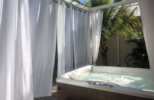 Englewood Apartment | Caribbean Tiki Hut relaxation. Enjoy the Islands & Boca Grande without the costs