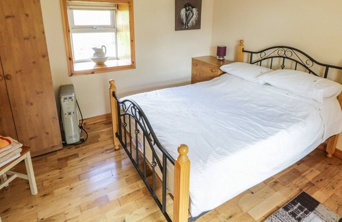 Drumnasillagh Cottage | CARNAWEEN VIEW, pet friendly in Glenties, County Donegal