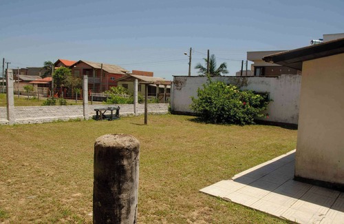 Passo de Torres House | Casa Aventura in front of the beach, internet, two bedrooms, covered garage and patio