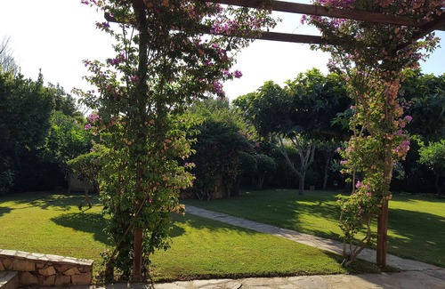 Porto Taverna House | Casa Camelie big gardened apartment 2 min. walk from the beach, internet Wi-Fi