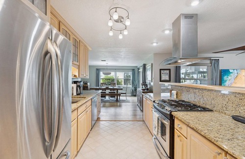 Cocoa Isles Country Club House | Casa Coco Retreat w/Heated Pool & Outdoor Kitchen!