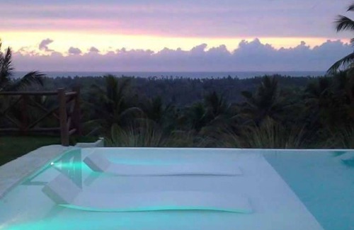 Las Terrenas Villa | Casa Cocoloba offers a splendid view of the sea and 4000 meters of parkland.