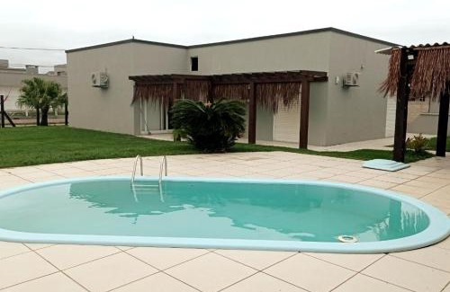 Xangri-La House | Casa com 4 dormitórios e piscina em Xangri-lá