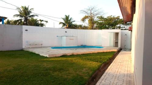 Parque Oasis House | Casa com lazer e a 200 m da praia em Peruibe SP