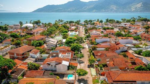 Praia do Pontal da Cruz House | Casa com piscina em São Sebastião próxima a praia e espaços de casamentos