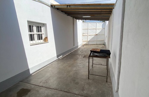 San Juan House | Casa Comoda con Cochera - Experiencia Inolvidable