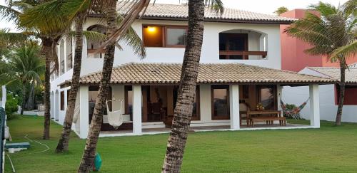 Itacimirim House | Casa de Gente Feliz Guarajuba - 6 suítes Pé na Areia