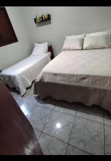 Alvorada House | Casa de Temporada Ipê Rosa
