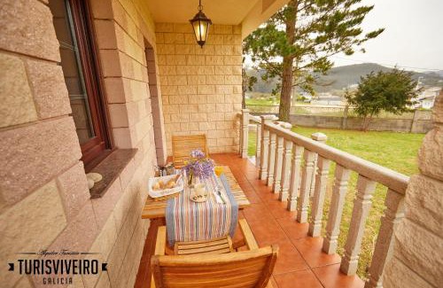 Faro House | Casa en la playa de Area con finca privada