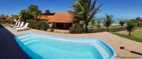 Zumbi House | Casa espetacular em condomínio pé-na-areia, PZ11