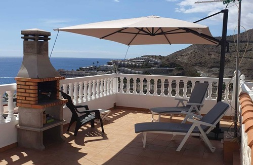 Balito Apartment | Casa Estrellas Zonovergoten Terras met Zeezicht. 5 min Lopen van Anfi Del Mar