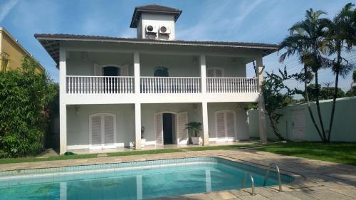 Balneario Praia do Pernambuco House | Casa Eventos e Temporada com 4 suites, piscina, churrasqueira, Wi-Fi, Ar Condicionado - Proximo Praia Mar Casado e Pernambuco - Guaruja -