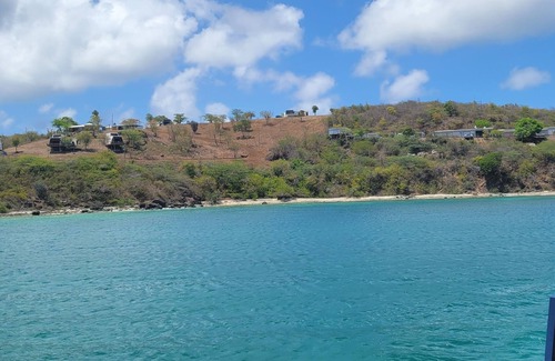 Villa Flamenco Cottage | Casa LOLO on hills of Culebra, mountain and airport views .
