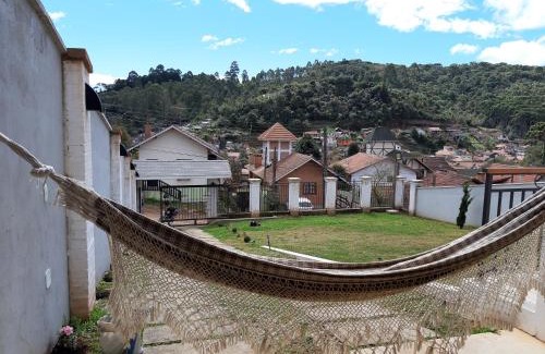 Monte Verde House | Casa MAGNÍFICA a 1 Km do centrinho com Suíte e Hidro