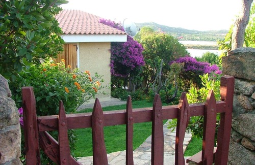 Porto Taverna House | Casa Oleandro, gardened apartment, 100 meters walk to the beach, internet Wi-Fi