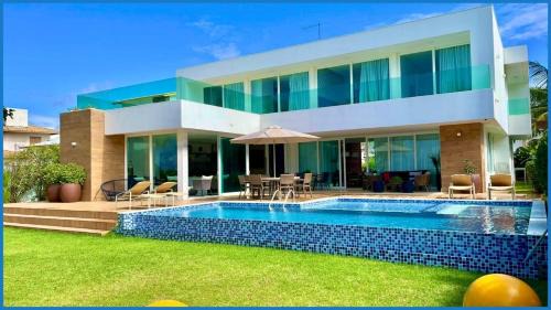 Parafuso House | Casa Paraíso 6 Suítes Pé na Areia em Guarajuba