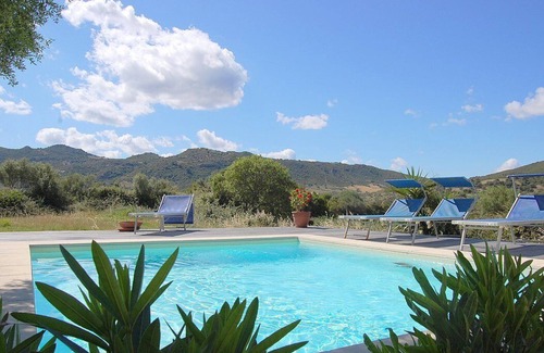 Loiri Porto San Paolo House | Casa Perella C: A graceful cottage surrounded by the greenery, with Free WI-FI.
