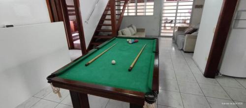 Jardim Neptunia House | Casa piscina pé na areia Bertioga