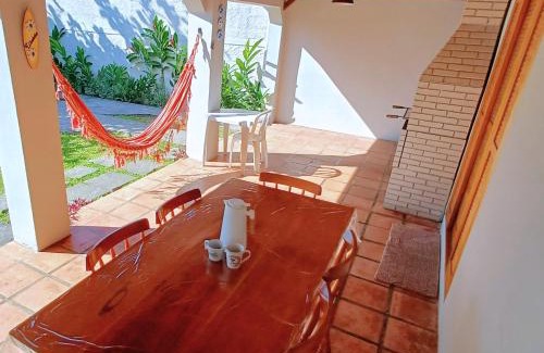 Estufa I House | Casa Temporada Ubatuba próxima à praia, check-in e out flexíveis com 5 vagas na garagem, wifi