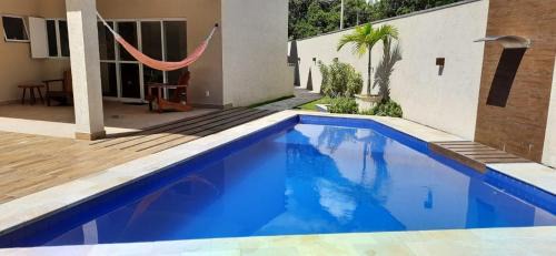 Costa do Sol House | CASA TERREA WI-FI 3 SUITES 900m PRAIA DE GUARATUBA SP