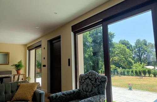 Villalba House | Casa verde de Lobán