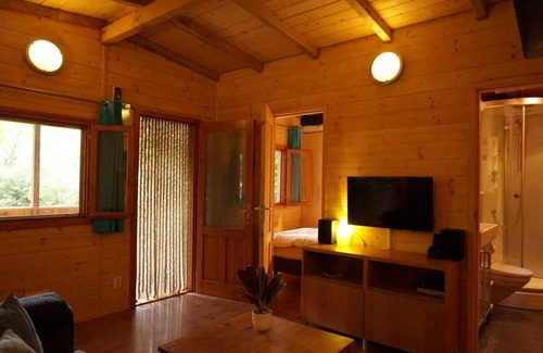 Porlezza Ski Chalet | CASASdeCASPER / Italy by the water. With views of the lake and mountains.