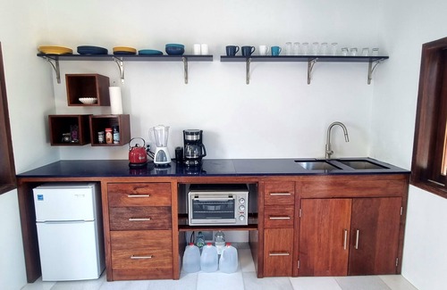 Long Bay Apartment | Castle Studio Sunset with Breakfast & Kiteboarding Available