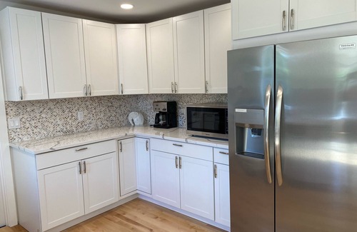 Hampton Bays House | Centrally located, newly renovated and furnished 4 bed/4 bath + heated pool