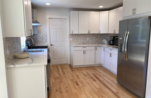 Hampton Bays House | Centrally located, newly renovated and furnished 4 bed/4 bath + heated pool