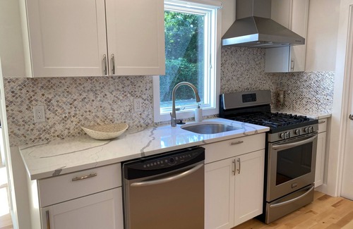 Hampton Bays House | Centrally located, newly renovated and furnished 4 bed/4 bath + heated pool