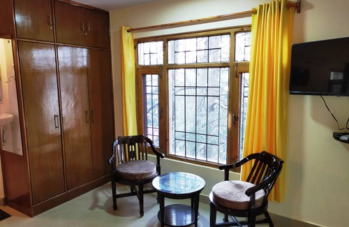 Shimla Apartment | Centrally located yet offers tranquility amidst a coniferous thicket.