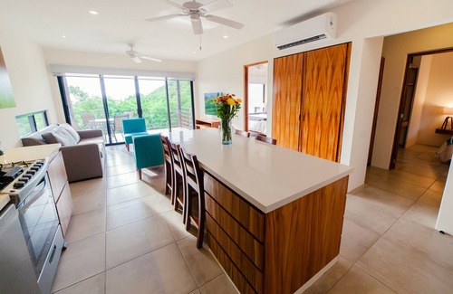 P Chahue Condo | Centrally located with private rooftop terrace with views, BBQ and shared pool.