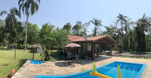 Porto de Cima House | Chácara Porto Bello - Casa com Piscina em Morretes