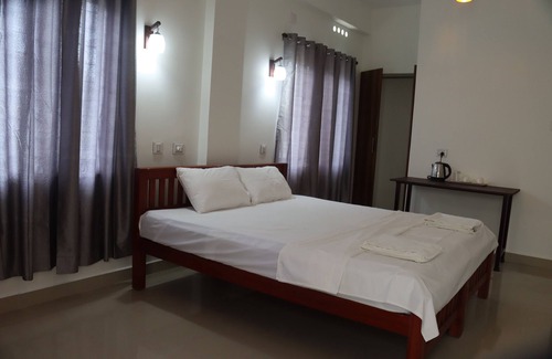 Alwaye Hotel | Chael Airport Residency Double Room Non AC, Nedumbbassey,Cochin .