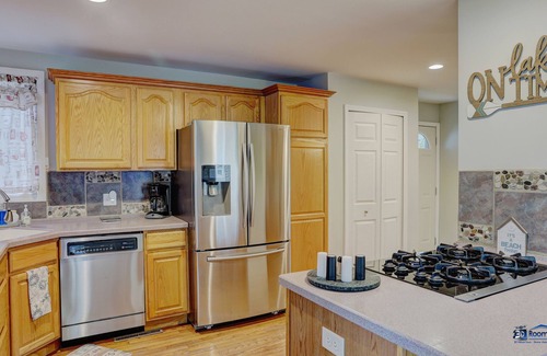 Ingleside House | Chain O' Lakes life.serene bay w/private beach access. Kayaks & Boats welcome