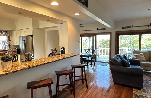 Bellaire House | Chain of Lakes Escape with Hot Tub & River Access!