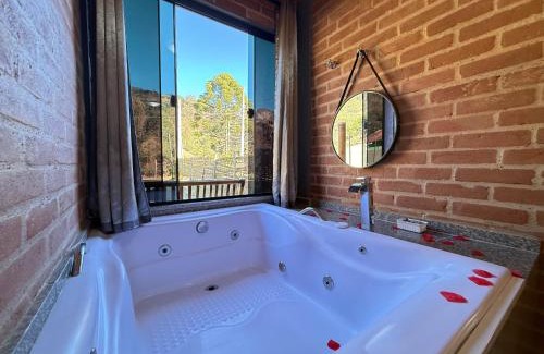 Sao Bento do Sapucai Apartment | Chalé Embahu com Hidromassagem e Lareira