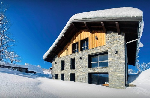 Doucy-Combelouviere Ski Chalet | Chalet Confidentiel - secluded stay mountain & valley views - OVO Network