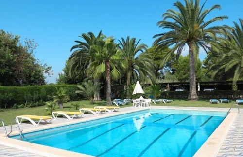 Cambrils Cabin | Chalet located on a wooded park of 8000m ² with large community pool, .
