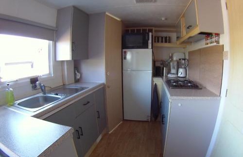 Warns Other | Chalet met 2 slaapkamers op gezellige camping met zwembad nabij Ijsselmeer