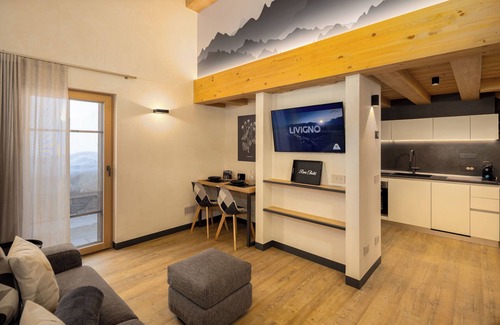Livigno Ski Chalet | Chalet 'River Villa Genf Spa - Relax' with Mountain View and Shared Garden