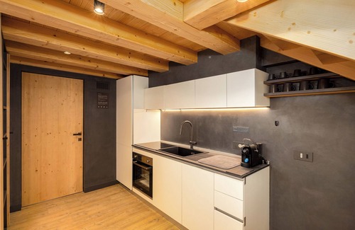 Livigno Ski Chalet | Chalet 'River Villa Genf Spa - Relax' with Mountain View and Shared Garden