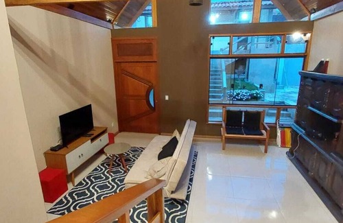 Paraisopolis Ski Chalet | Chalet-style house at the foot of the Mantiqueira mountains, southern Minas Gerais, Brazil.