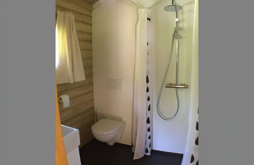 Zoutkamp Ski Chalet | Chalet the Kingfisher on small nature campsite 't Ol Gat