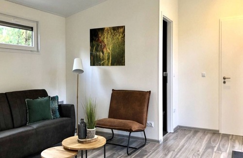 Bosgebied Hoenderloo House | Chalet with decorative fireplace, near Veluwe