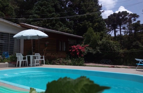 Vila Suica House | CHALET WITH SWIMMING POOL IN LAWN, CENTRAL AREA 3 BEDROOM, FIREPLACE, HEATING.