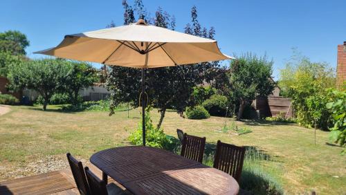 Arnieres-sur-Iton Bed & Breakfast | Chambre d'hôtes Les Glycines et petit déjeuner