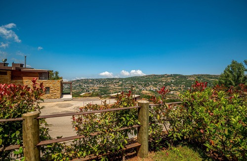 Kfardebian Ski Chalet | Charming 1-BR Chalet with Scenic Terrace in Redrock Faqra - Your Ideal Getaway!