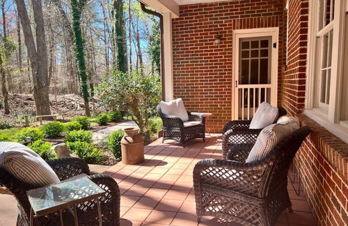 Steele Creek House | Charming 1930's English cottage with historic ambiance on three private acres